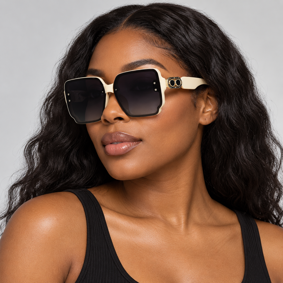 Adult woman wearing Nashi Pear T41 ivory square sunglasses