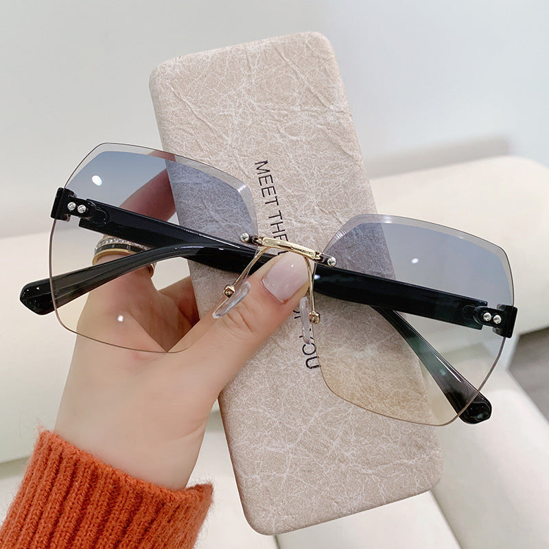 Nashi Pear 9231 black temples blue amber gradient lenses