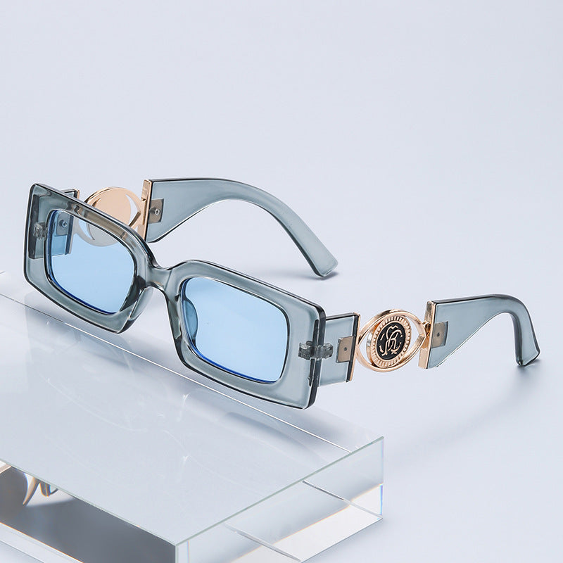 Nashi Pear 3033 square sunglasses, Clear gray frame with blue lenses