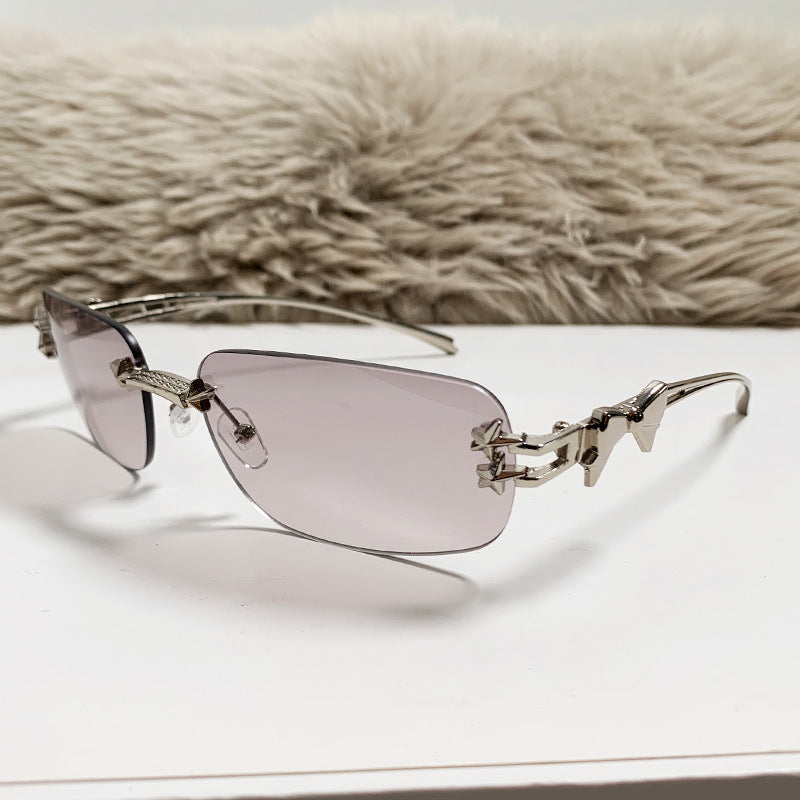 Nashi Pear 90325 oval sunglasses, nickel frame with light gray gradient lenses, single pair