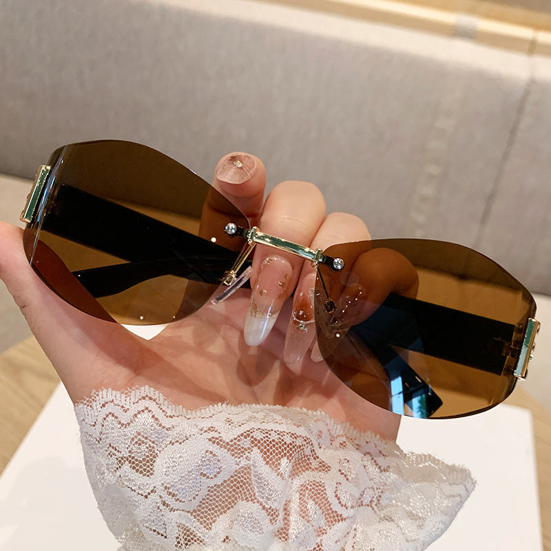 Nashi Pear 90328 geometric sunglasses with solid brown lenses
