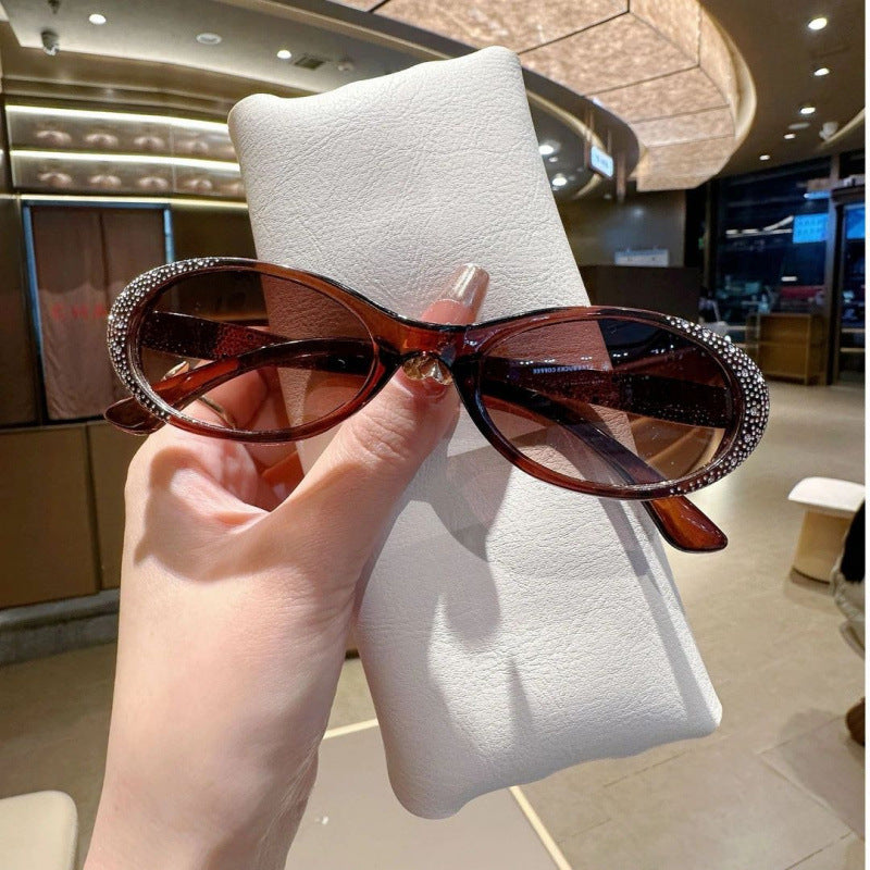 Nashi Pear 910 oval sunglasses, brown frame and tinted lenses, single pair