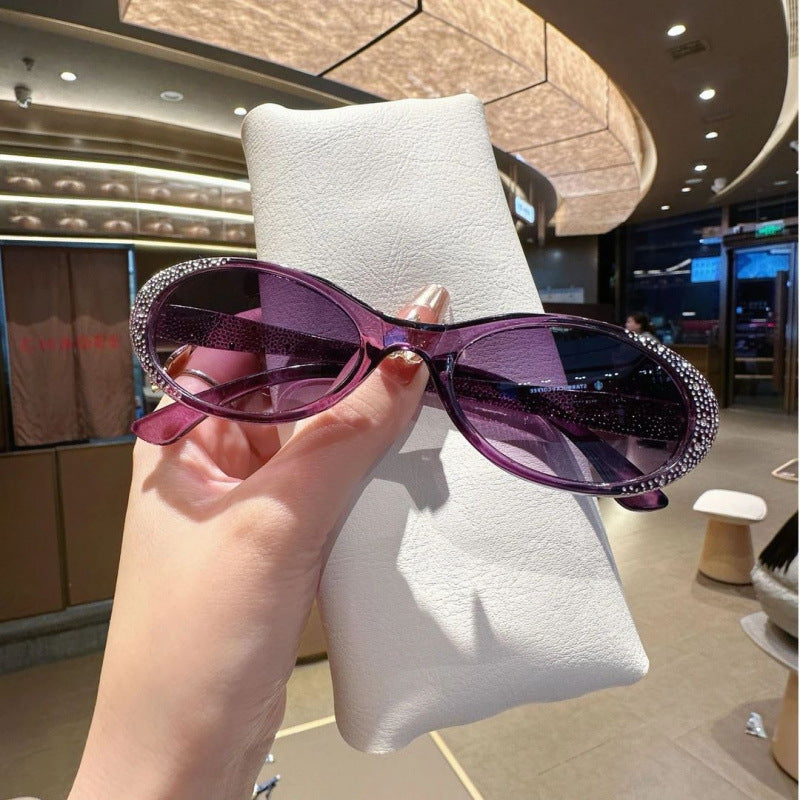 Nashi Pear 910 oval sunglasses, purple frame and tinted lenses, single pair