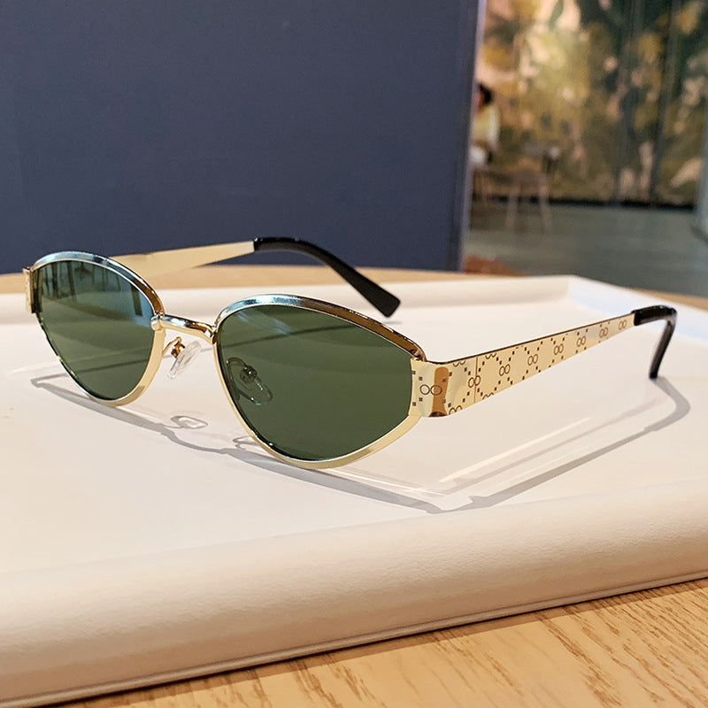 Nashi Pear 98163 cat-eye sunglasses, Gold frame with green lenses