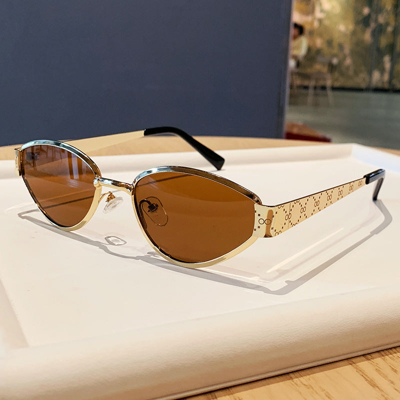 Nashi Pear 98163 cat-eye sunglasses, Gold frame with brown lenses