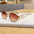 Nashi Pear 98184 oval sunglasses, Gold frame with brown gradient lenses