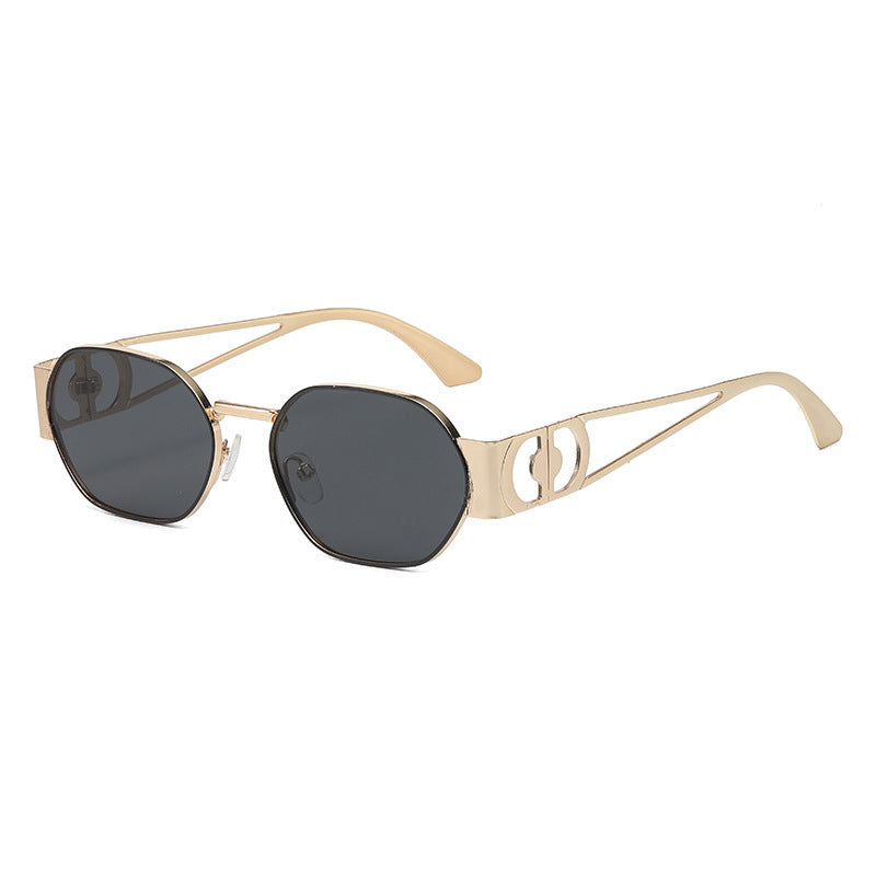 Nashi Pear 98184 oval sunglasses, Black and gold frame with solid gray lenses
