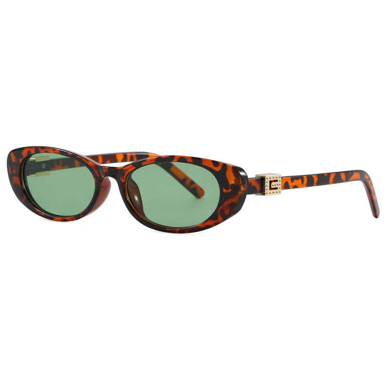 Nashi Pear 12 cat-eye sunglasses, Tortoise frame with green lenses