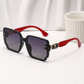 Nashi Pear T41 oversized square sunglasses, glossy black frame with red temples and dark lenses, single pair